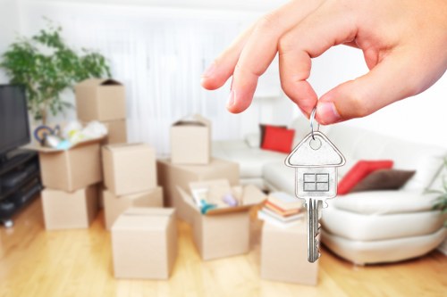 Removal team handling same day moving boxes in Balham