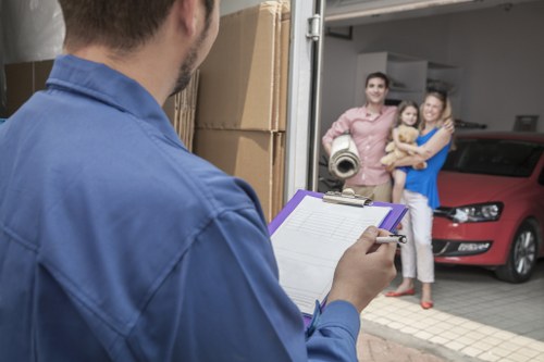 Local movers organising packed items for a Balham relocation