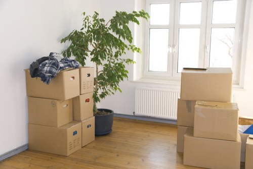 Organised flat removals service in Balham with boxes ready for transport