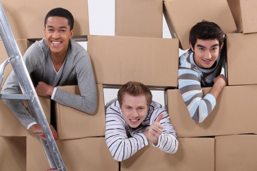 Local moving team handling boxes and furniture in Balham