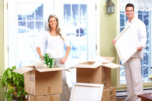 Loading furniture for a Balham move on a residential street