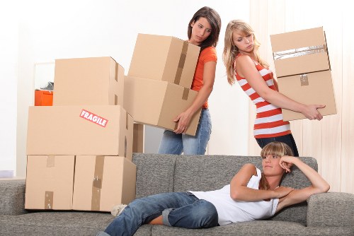 Organized relocation scene with boxes and a moving truck in Balham