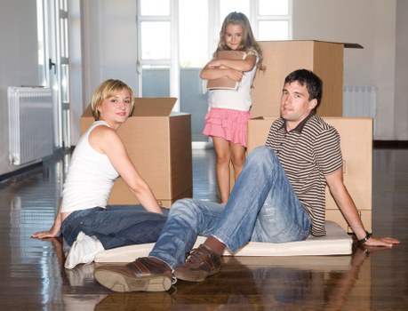 Loading furniture into a van for a Balham home move